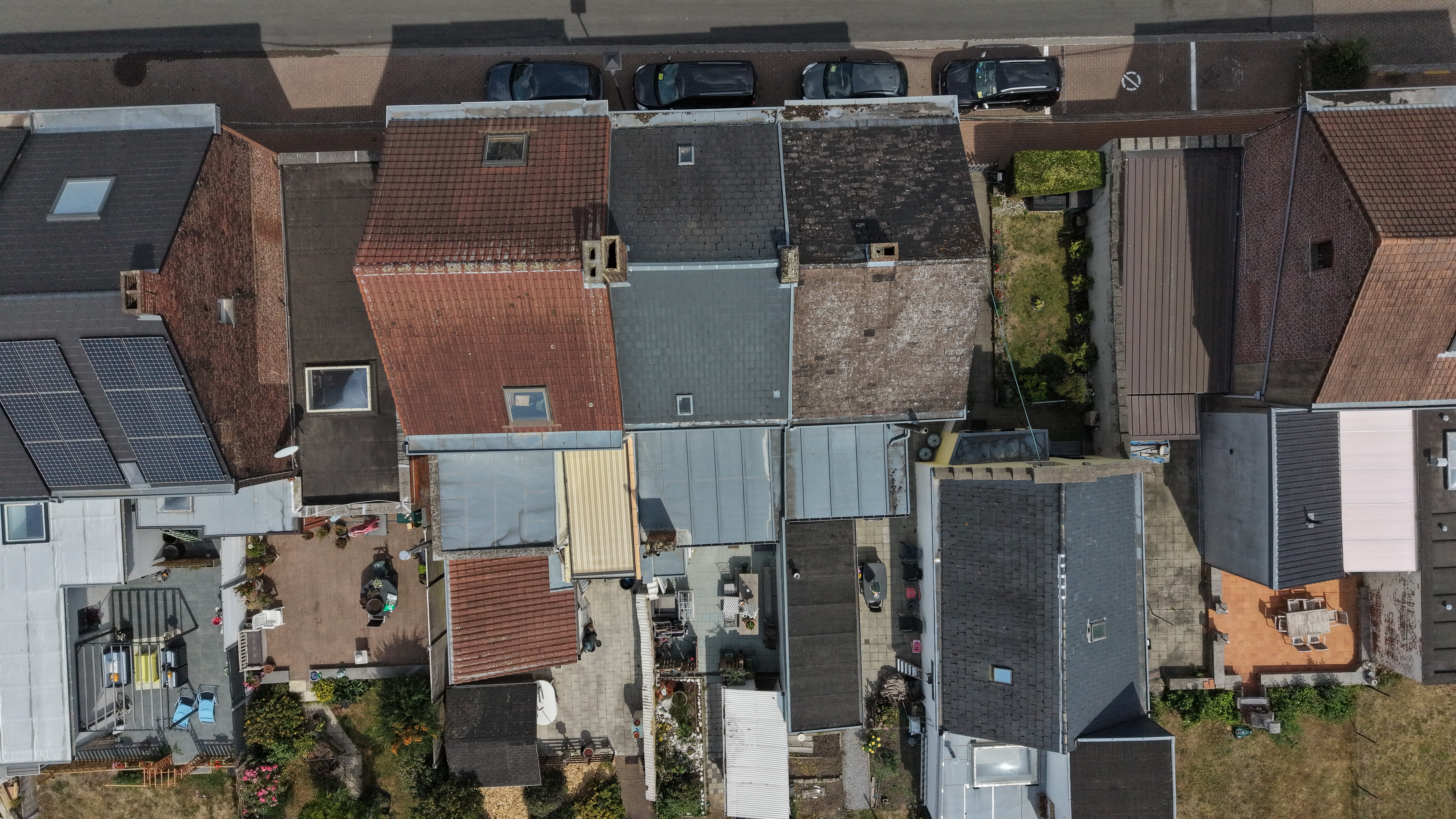 Aerial overview of residential roof inspection